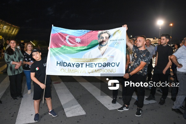 Vətənə qayıdan olimpiya çempionları Hidayət Heydərov və Zelim Kotsoyev