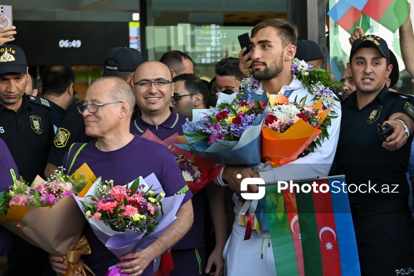 Vətənə qayıdan olimpiya çempionları Hidayət Heydərov və Zelim Kotsoyev