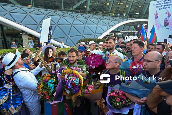 Vətənə qayıdan olimpiya çempionları Hidayət Heydərov və Zelim Kotsoyev