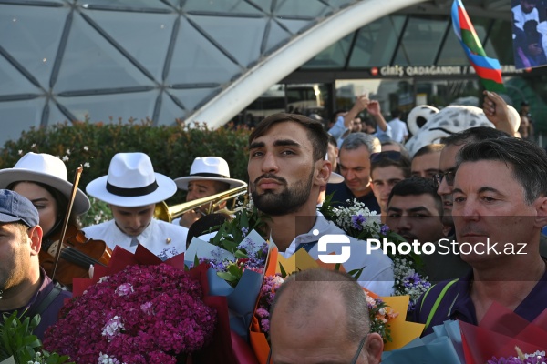 Vətənə qayıdan olimpiya çempionları Hidayət Heydərov və Zelim Kotsoyev