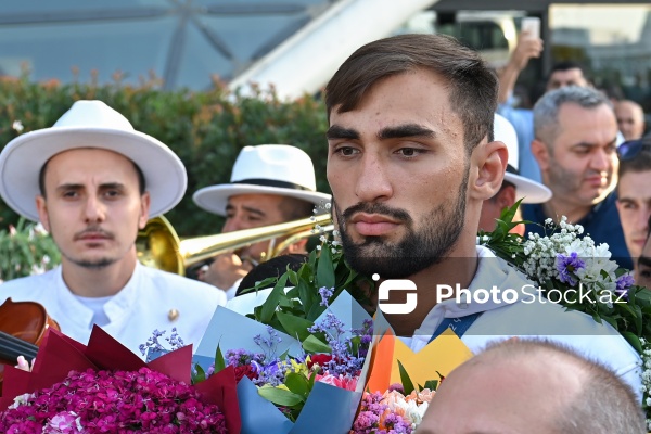 Vətənə qayıdan olimpiya çempionları Hidayət Heydərov və Zelim Kotsoyev