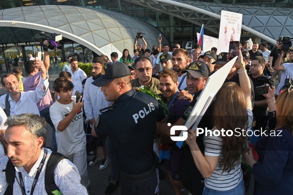 Vətənə qayıdan olimpiya çempionları Hidayət Heydərov və Zelim Kotsoyev